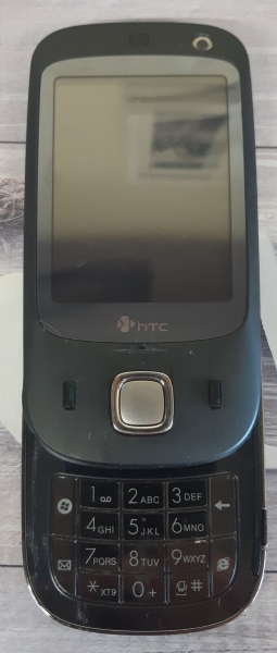 HTC Touch Dual NIKI100 – Schwarz Smartphone als Ersatzteil. Batterie defekt.