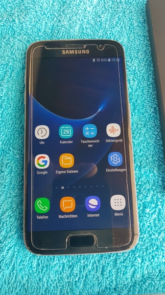 Smartphone Samsung Galaxy S7 schwarz mit Teilen wie auf Foto & OVP